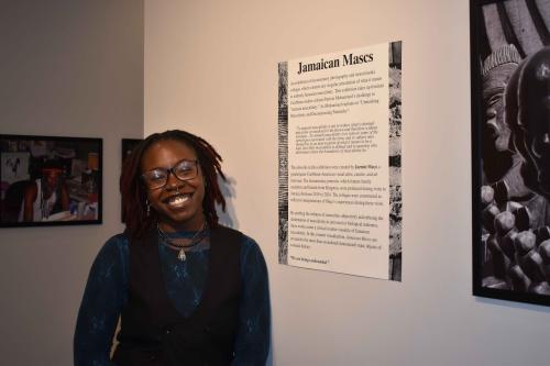 Portrait headshot of student standing in a museum